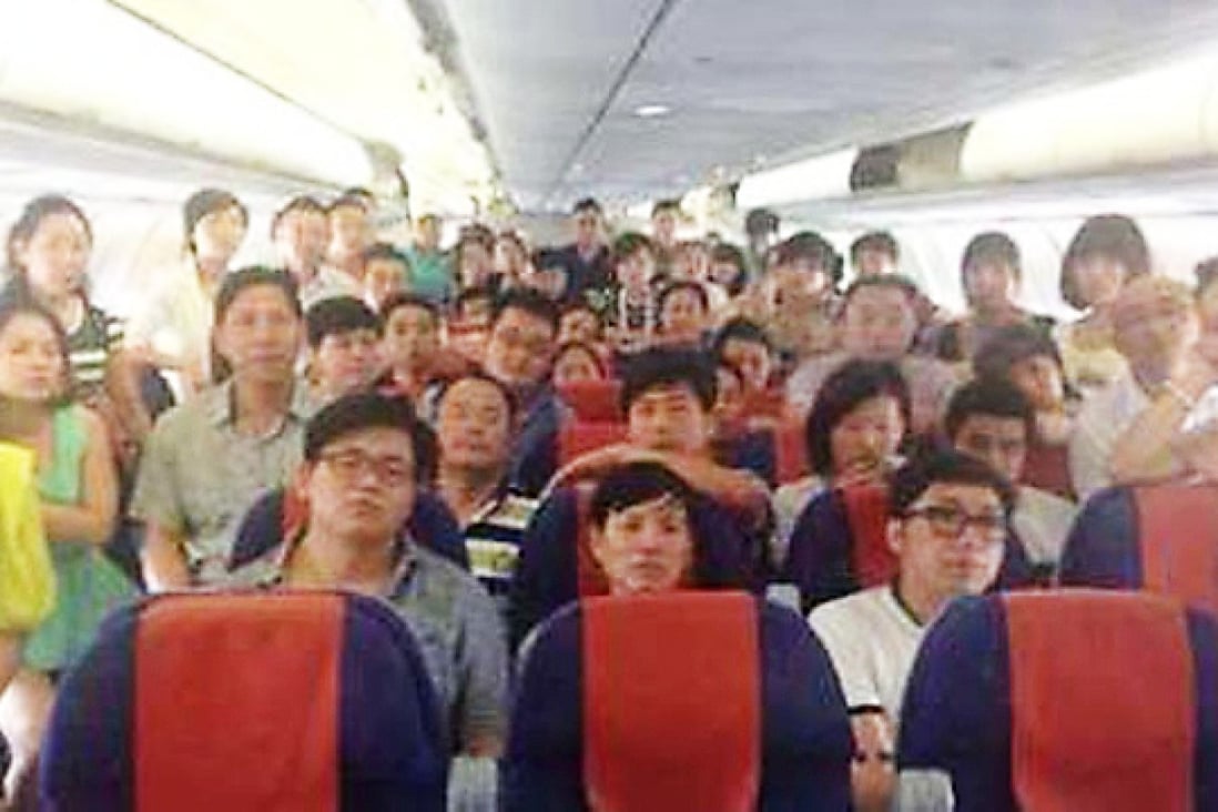 More than 70 passengers staged an 18-hour sit-in on Friday when their Hong Kong Airlines flight to Shanghai was cancelled. Photo: SCMP Pictures