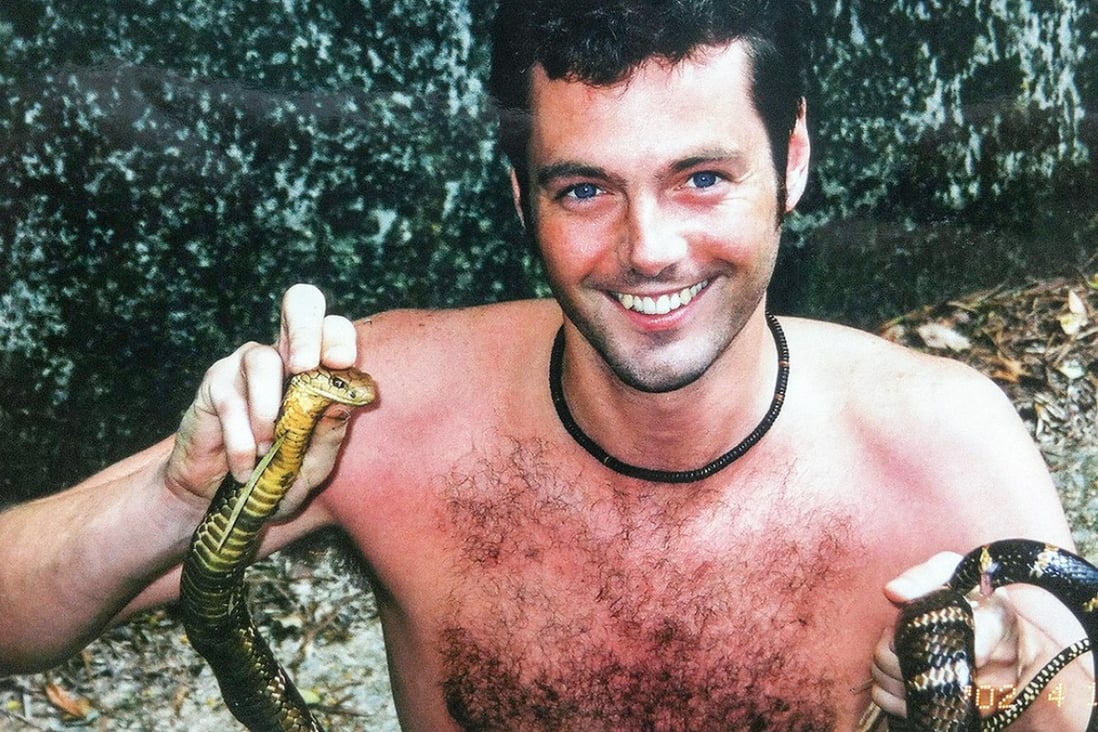 Stephen Loman with a rescued king cobra. Photos: Stephen Loman