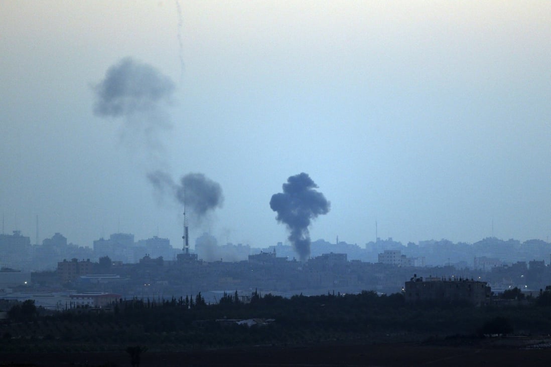 Smoke rises following Israeli strikes on Gaza on Thursday, seen from the Israel-Gaza border. Photo: AP