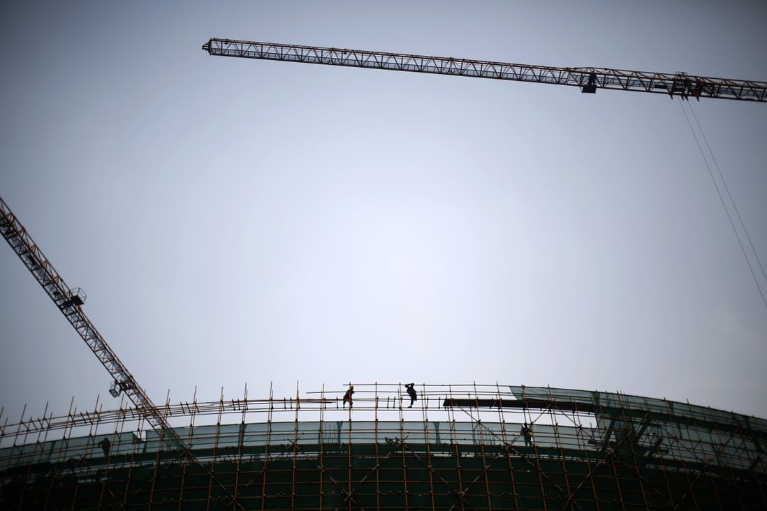 As the downturn deepens, developers in China are cutting back on new land purchases and slowing new projects. Photo: Reuters