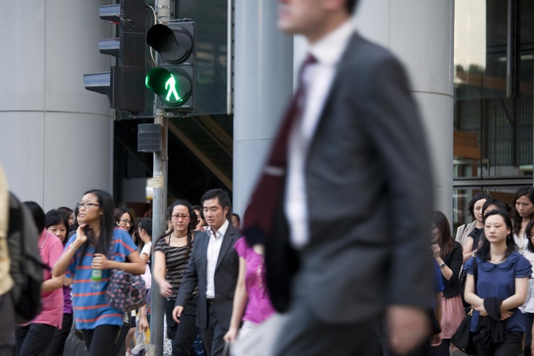 Office workers during peak hour in Central. Photo: Bloomberg