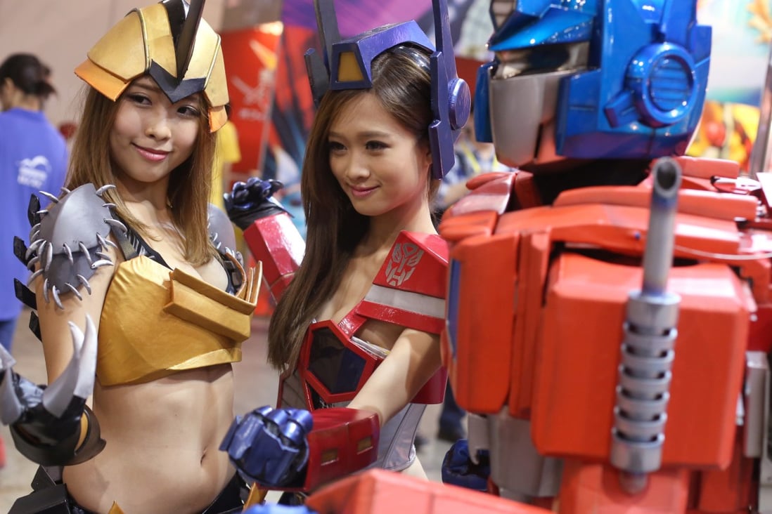 Transformers cosplay girls pose during during the 16th Ani-Com and Games expo. Photo: Sam Tsang