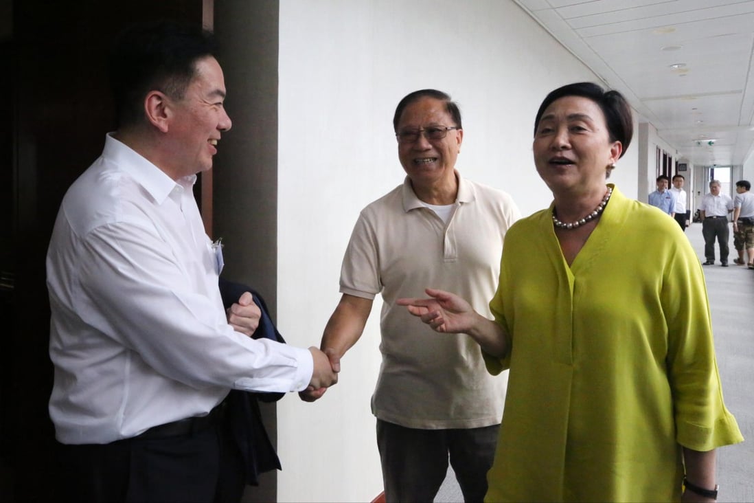 David Wong, left, with former lawmaker Yeung Sum and lawmaker Emily Lau. Wong supports a 50 per cent threshold. Photo: Felix Wong