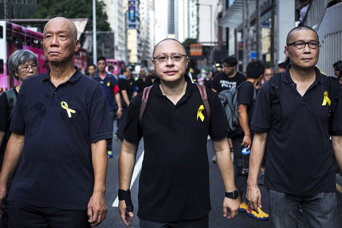 Occupy Central organiser Benny Tai (centre) says the Occupy movement may not reverse the situation immediately, but it is crucial as it would help nurture Hong Kong's civil society. Photo: EPA