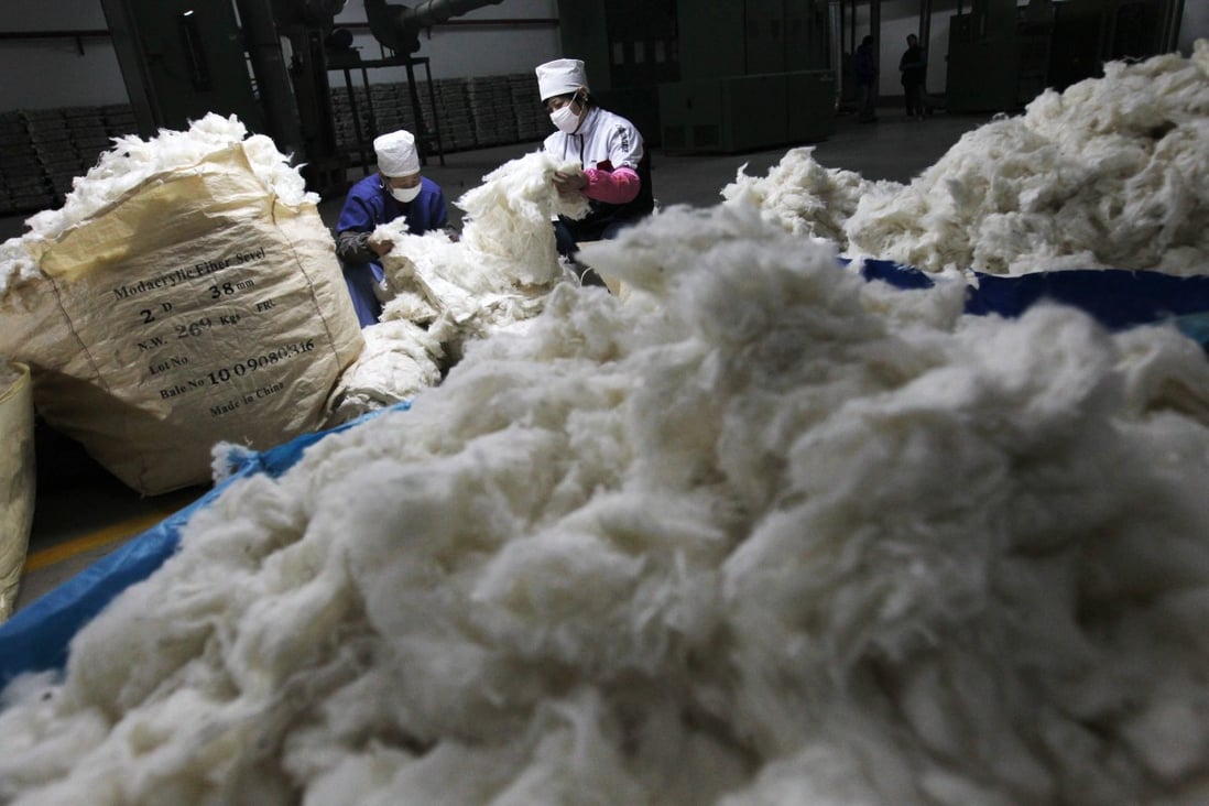 Non-quota imports are subject to a 40 per cent tariff, so the restricted availability of import quotas will dampen mainland demand for foreign cotton. Photo: EPA