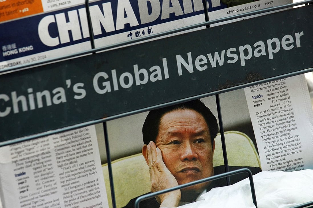 Former security chief Zhou Yongkang, under investigation for for possible “serious violations of party discipline” on the cover of China Daily. Photo: Reuters