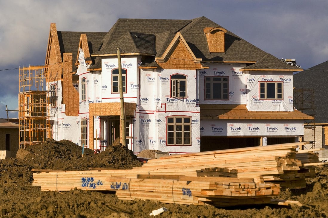 The drop in Canada's average fixed mortgage rate has boosted home prices and resales. Photo: Bloomberg