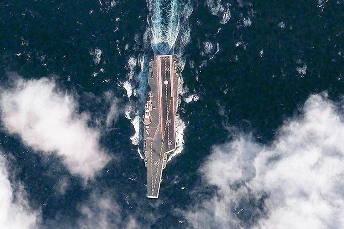 China's first aircraft carrier, the Liaoning, undergoes trials in the Yellow Sea. Photo: Reuters