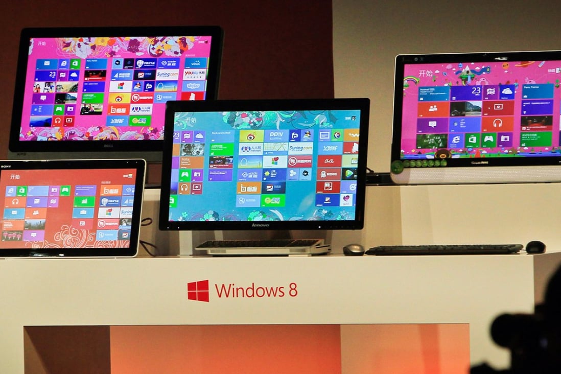 Microsoft's tablet computer and Windows 8 software on display in Shanghai. China hopes to phase out the use of Windows and install its own operating system on government computers. Photo: AFP