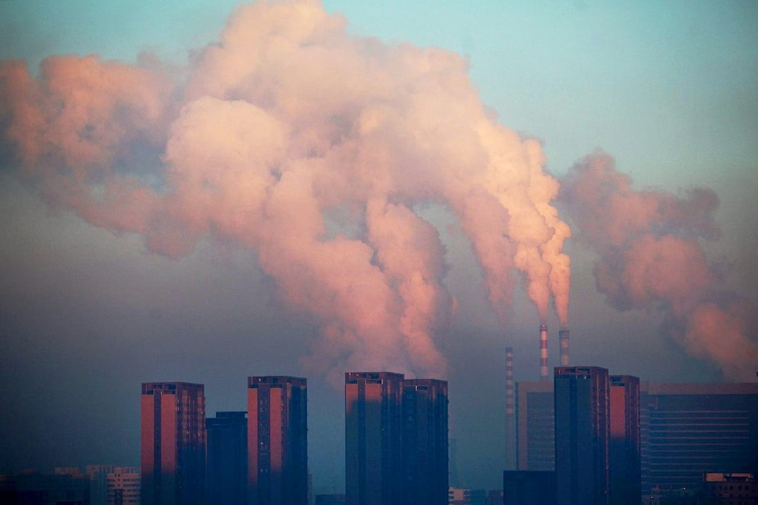 A power plant pollutes the air over Changchun, in northeastern Jilin province. The health and environmental costs of coal use add up to HK$330 per tonne. Photo: AFP