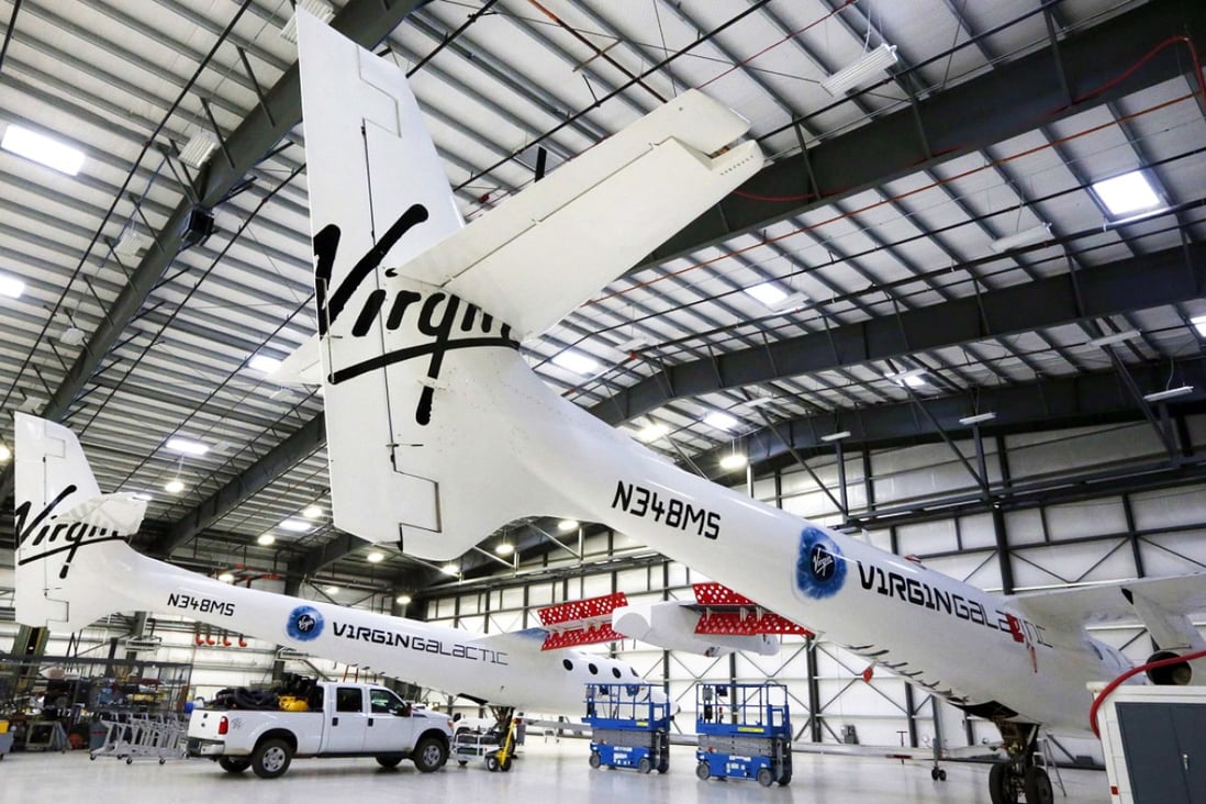 Virgin Galactic's WhiteKnightTwo carrier aircraft mothership, which landed safely after splitting from SpaceShipTwo, is seen in a hangar at Mojave Air and Space Port in Mojave, California. Photo: Reuters