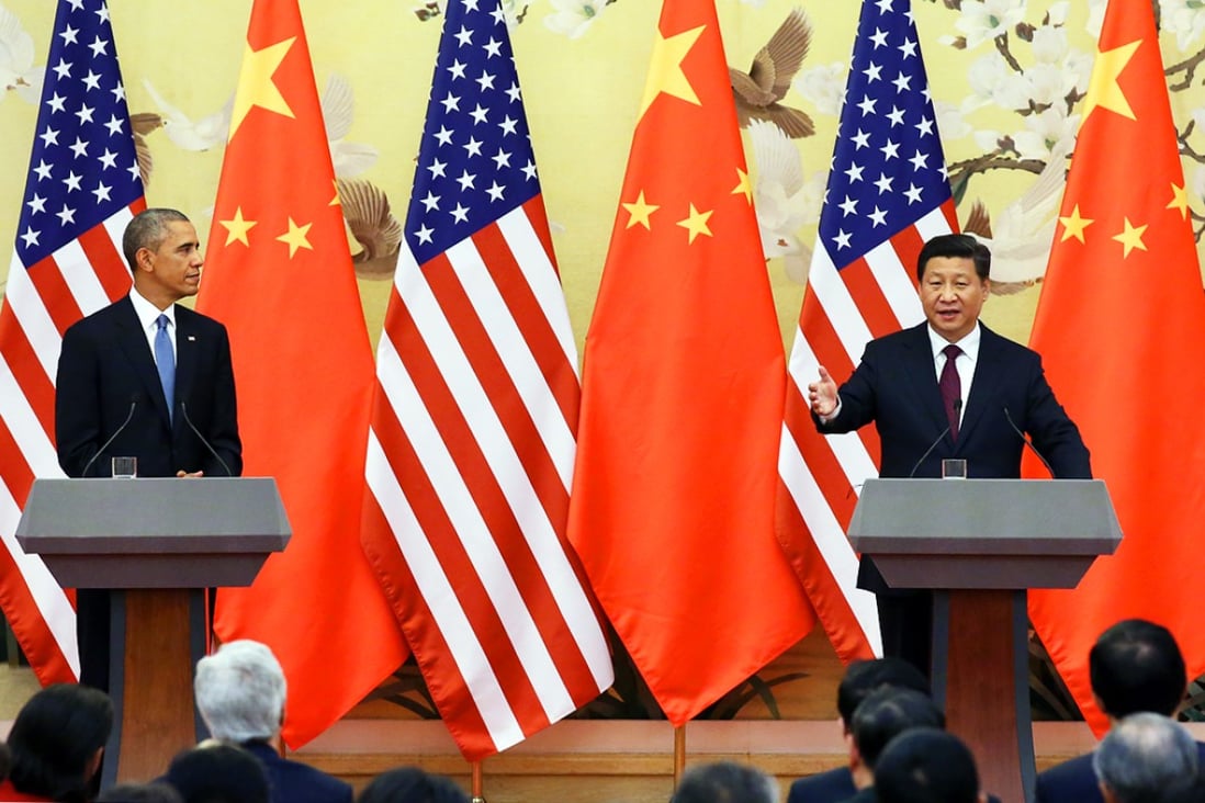 Obama and Xi take questions from the press in Beijing. Photo: AFP