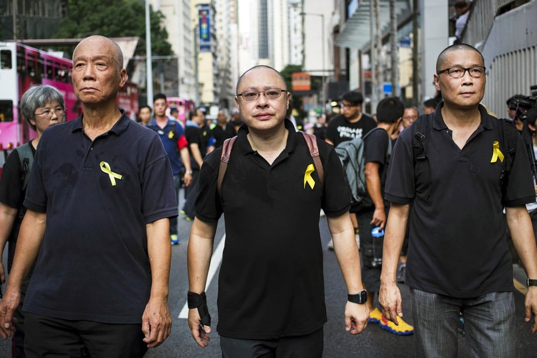 Occupy Central co-founders (from left) Reverend Chu Yiu-ming, Professor Benny Tai, Chan Kin-man. Photo: EPA