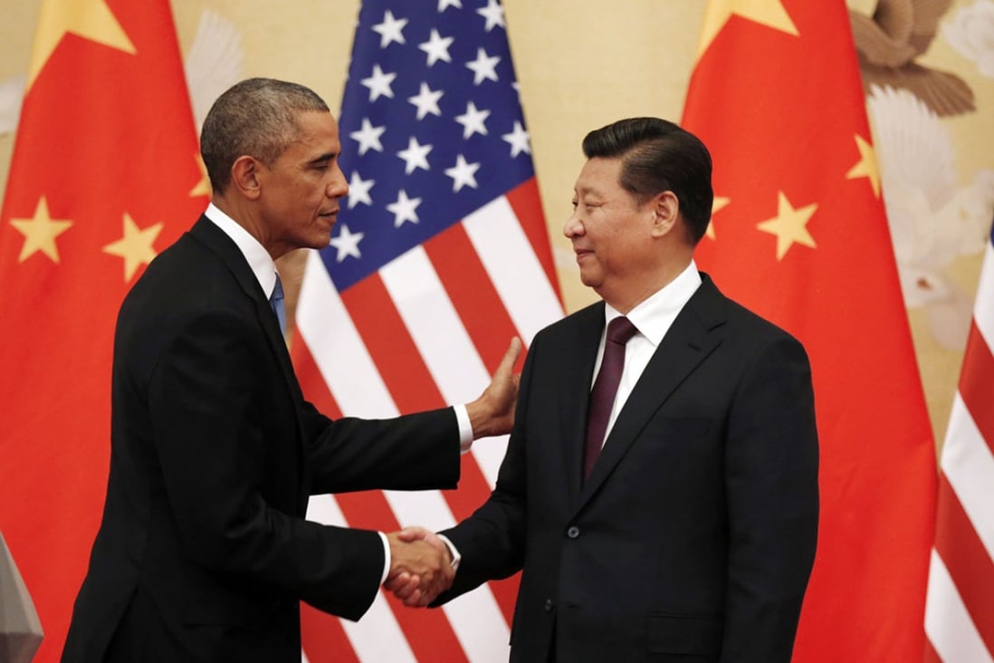 US President Barack Obama and Chinese President Xi Jinping shake hands at the end of their news conference in the Great Hall of the People in Beijing. Photo: Reuters