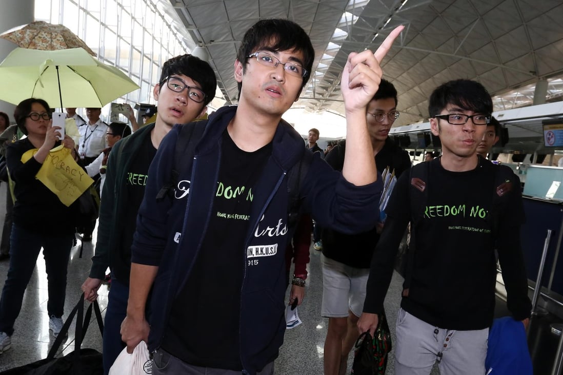 Nathan Law, Alex Chow and Eason Chung at Hong Kong airport after being banned from flying. Photo: Jonathan Wong