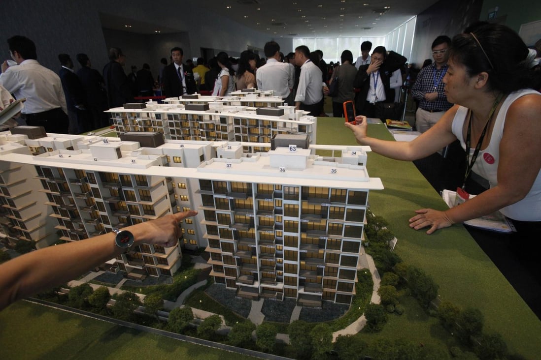 The government says there is some distance to go for Singapore's home prices to achieve "a meaningful correction". Photo: Reuters