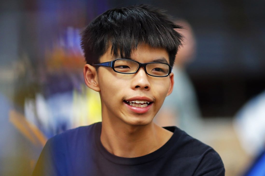 Joshua Wong gives an interview in Hong Kong's occupied financial central district. Photo: Reuters