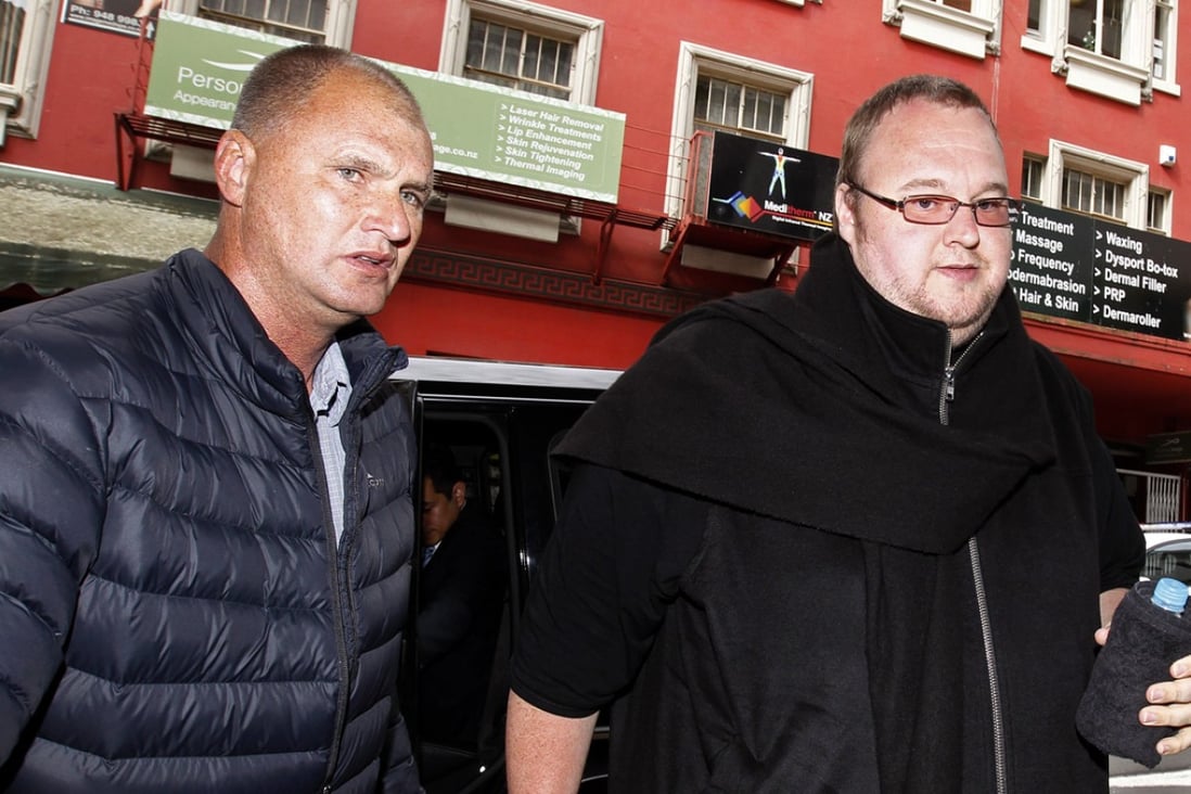 Kim Dotcom (right) arrives at Auckland District Court in Auckland, New Zealand on November 27, 2014. Photo: AP