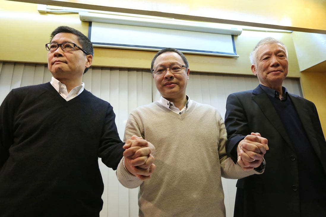 Occupy Central co-founders Dr Chan Kin-man, Benny Tai Yiu-ting and Reverend Chu Yiu-Ming, meet the media to urge students to go home as they vow to hand themselves in to police tomorrow. Photo: Sam Tsang