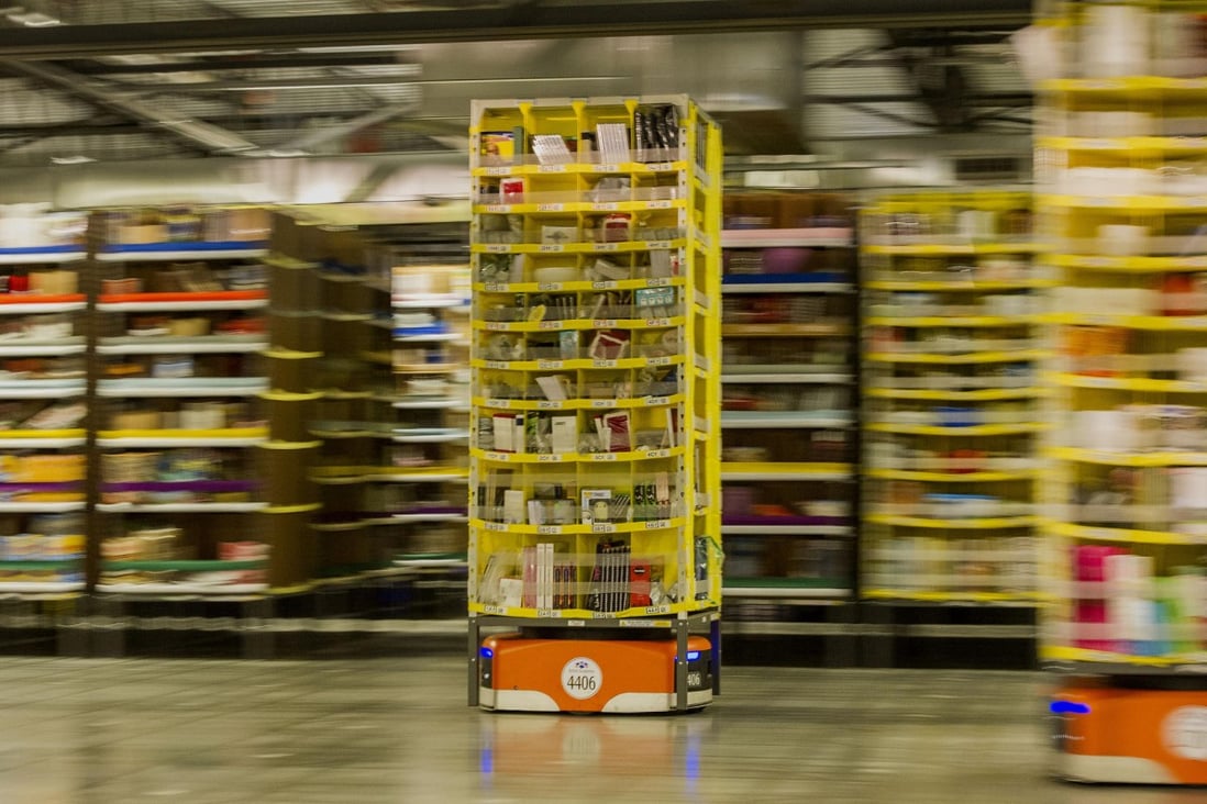 Amazon.com has installed more than 15,000 robots across 10 US warehouses, a move that promises to cut operating costs by one-fifth and get packages out the door more quickly in the run-up to Christmas. Photo: Bloomberg