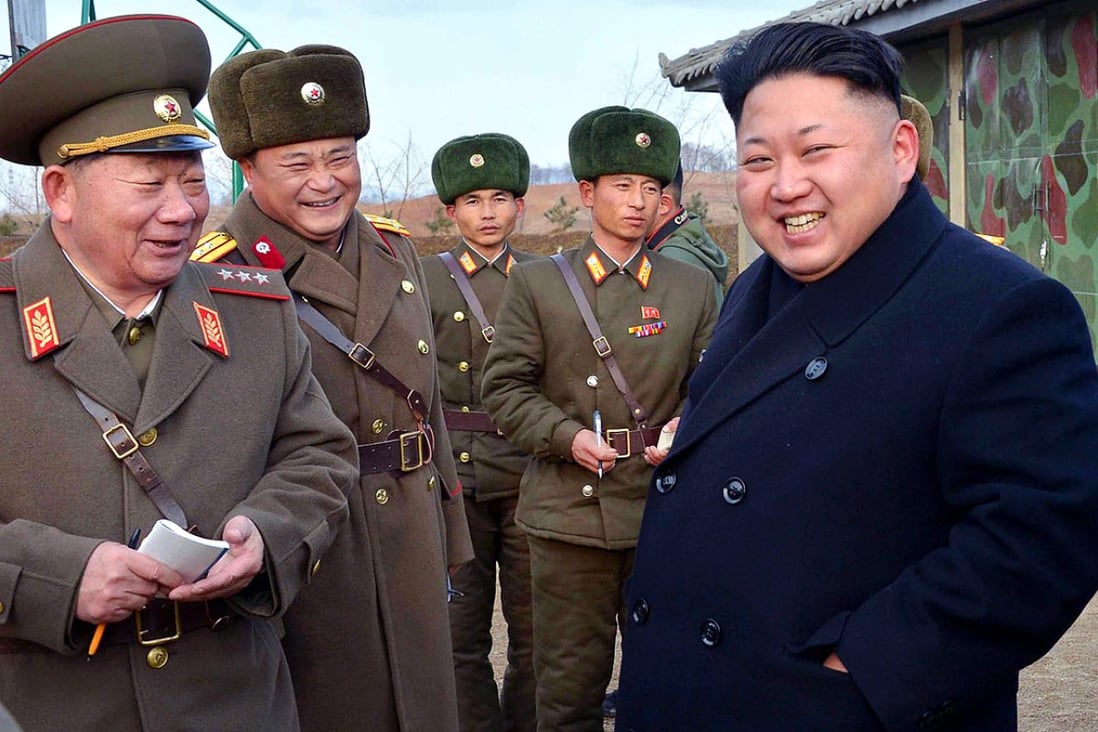North Korean leader Kim Jong-Un (right) inspects the artillery company under Korean People's Army (KPA) unit 963 which started the new year combat and political drill at an undisclosed place in North Korea. Photo: AFP