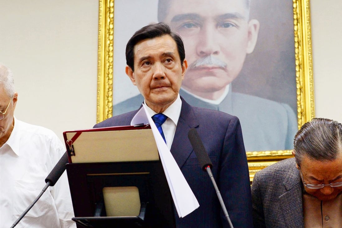 President Ma Ying-jeou (centre) has said he will resign as the Kuomintang party's chairman tomorrow. Photo: Kyodo
