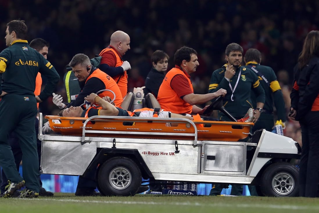 South Africa captain Jean de Villiers is stretchered off after shattering his left knee in the test against Wales at the Millennium Stadium last weekend. Photo: Reuters