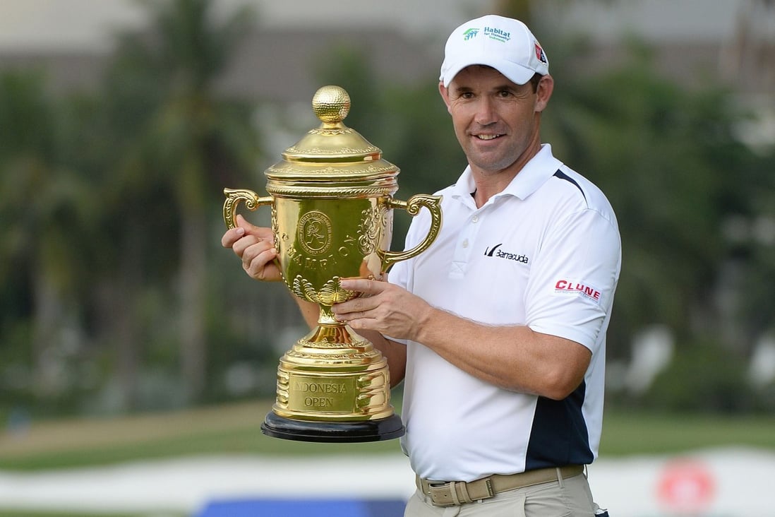 Padraig Harrington of Ireland with his trophy after winning the Bank BRI Indonesia Open in Jakarta. Photo: AFP