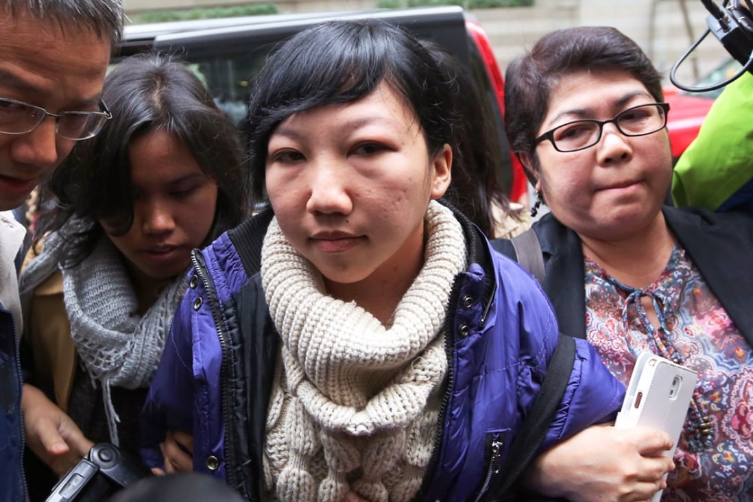 Erwiana Sulistyaningsih, an Indonesian domestic worker who accuses her Hong Kong employer of subjecting her to six months of physical abuse, arrives at the District Court in Wan Chai on Monday. Photo: Sam Tsang