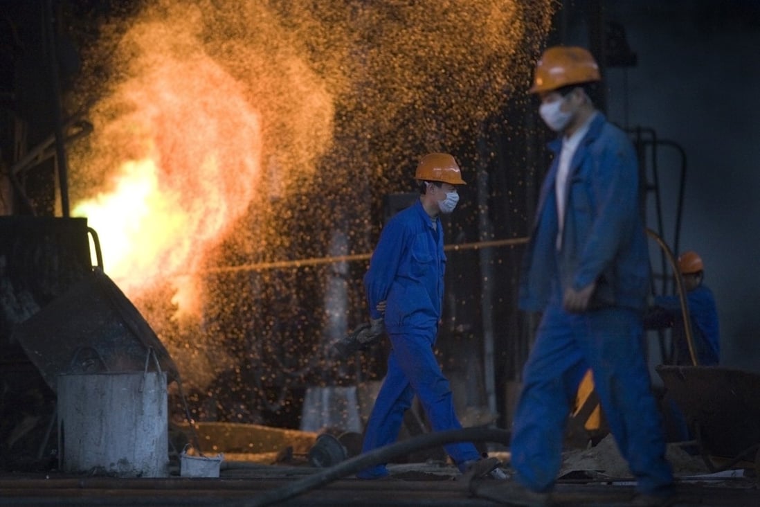 File photo of metal workers at a copper smelter in China. Photo: Bloomberg