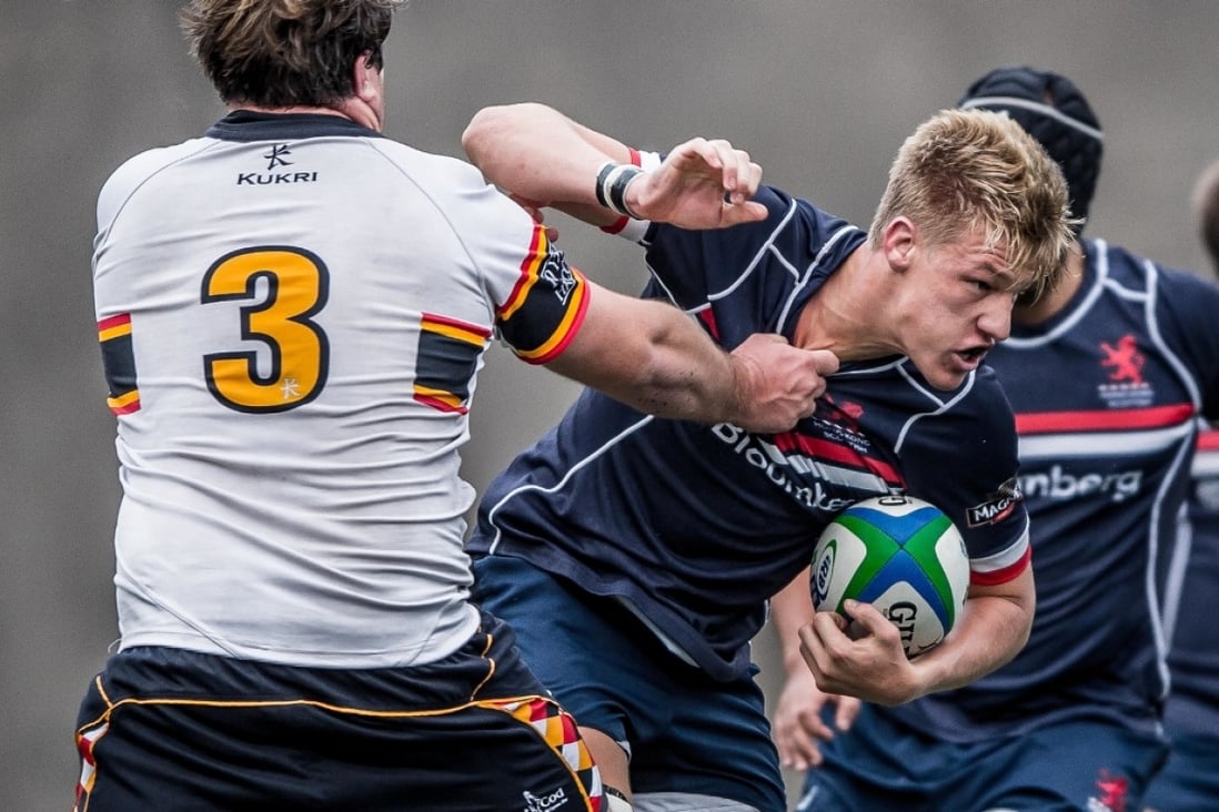 Hong Kong Scottish second-rower Mike Parfitt (right) looks for a way past HKCC’s Rohan Cook during last weekend’s Premiership victory for the Shek Kip Mei outfit. Photo: HKRFU