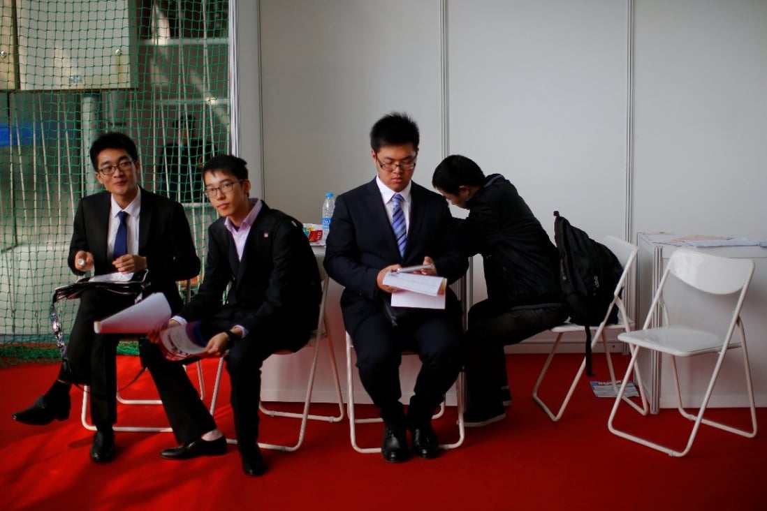 Students at a job fair in Shanghai. Photo: Reuters