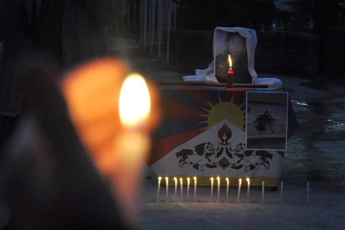Candle light vigil for Tsepe Kyi after she self-immolated herself for the Tibet cause. Photo: EPA