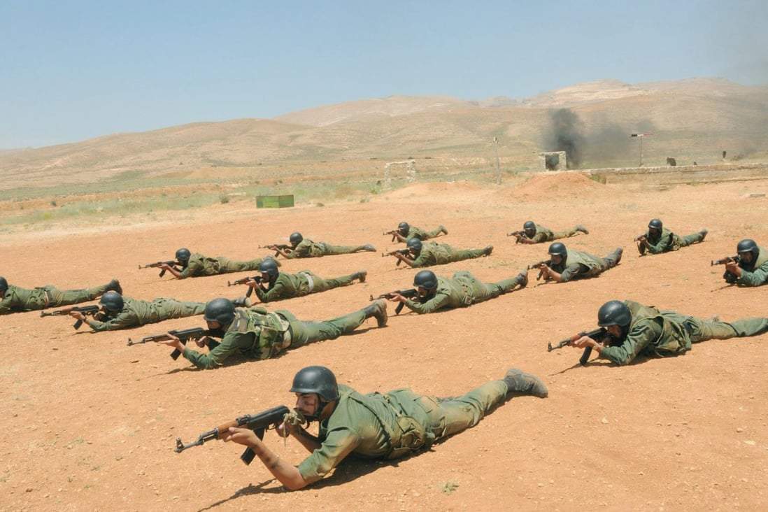 Syrian soldiers take part in a training exercise at Deir Ezzor. Photo: AFP