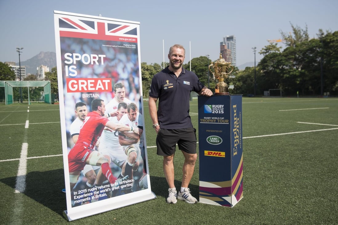 Former England sevens captain Ollie Phillips with the Webb Ellis Cup during a 2015 Rugby World Cup promotional event in Hong Kong. Photo: SCMP Picture