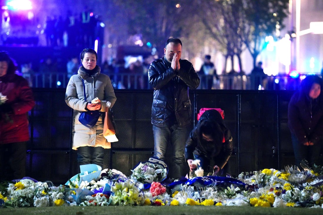 China's Modern College of Northwest University, in Xian, says its ban on students celebrating Christmas was 'vindicated' by the New Year's Eve stampede in Shanghai, which killed at least 36 people. Photo: AFP