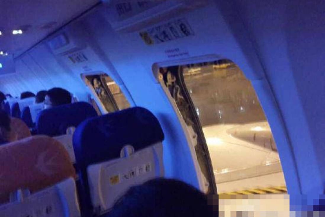 The plane's emergency exits were forced open.