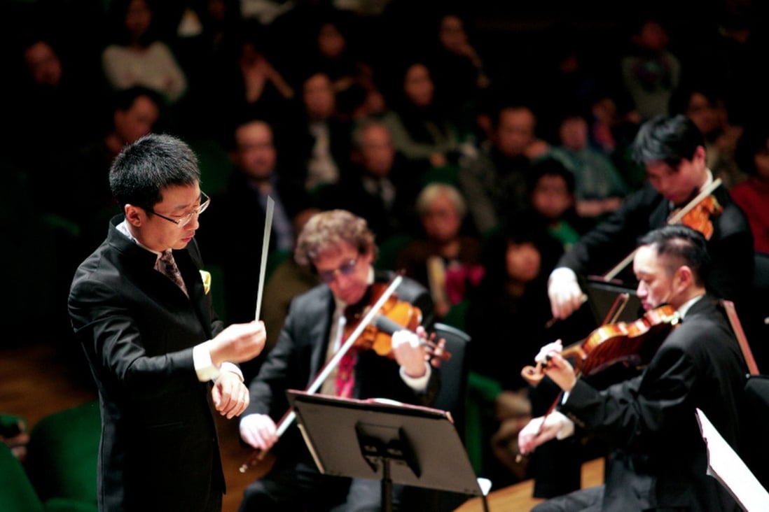 The MedArt Orchestra in action under the baton of guest conductor Li Xincao (left). Photo: Fritz Wong