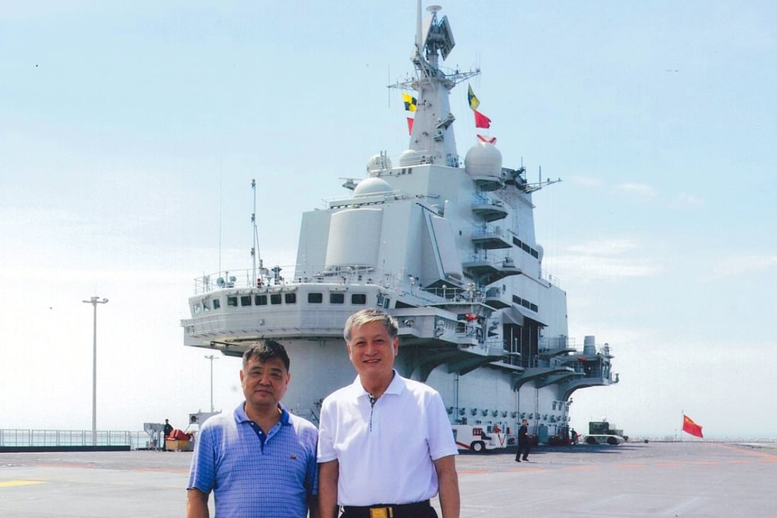 Xu Zengping and former deputy commander of the PLA Navy Su Shiliang on the deck of the Liaoning. Photo: SCMP