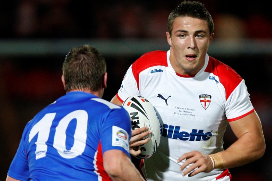 Sam Burgess braces for impact during a Four Nations rugby league match between England and France. The code-swapping centre may now see his bid for a place in England’s rugby union squad boosted by the midfield injury crisis. Photo: AP