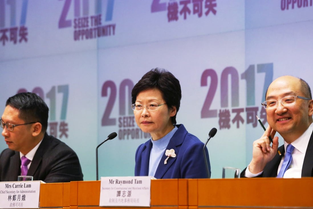 (Left to right) Secretary for Justice Rimsky Yuen Kwok-keung, Chief Secretary Carrie Lam Cheng Yuet-ngor and Secretary for Constitutional and Mainland Affairs Raymond Tam Chi-yuen attend a press conference to promote the government's controversial second round of public consultation on the method for selecting the Chief Executive of Hong Kong by universal suffrage. Photo: David Wong
