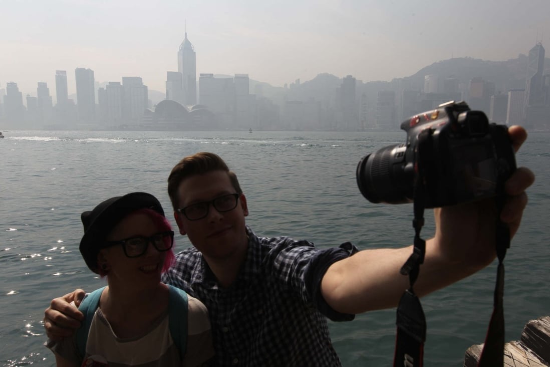 The Hong Kong skyline was blurred by haze on Thursday morning. Photo: Edward Wong