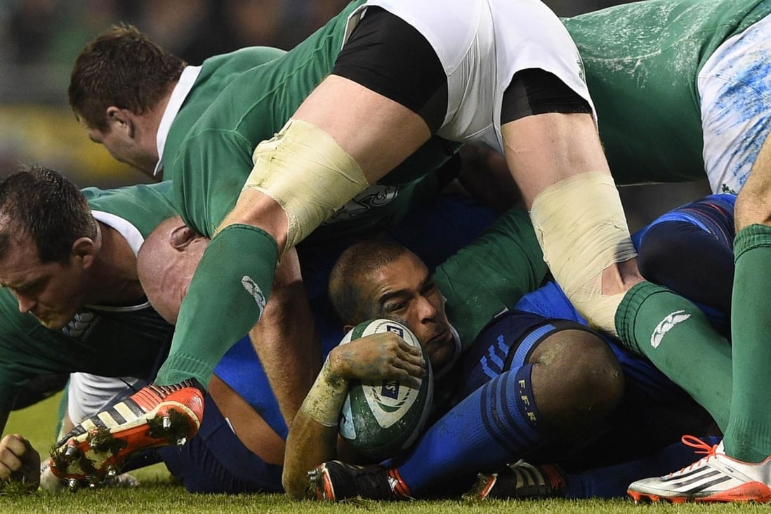Ireland winger Simon Zebo holds on to the ball against France. Photo: AFP