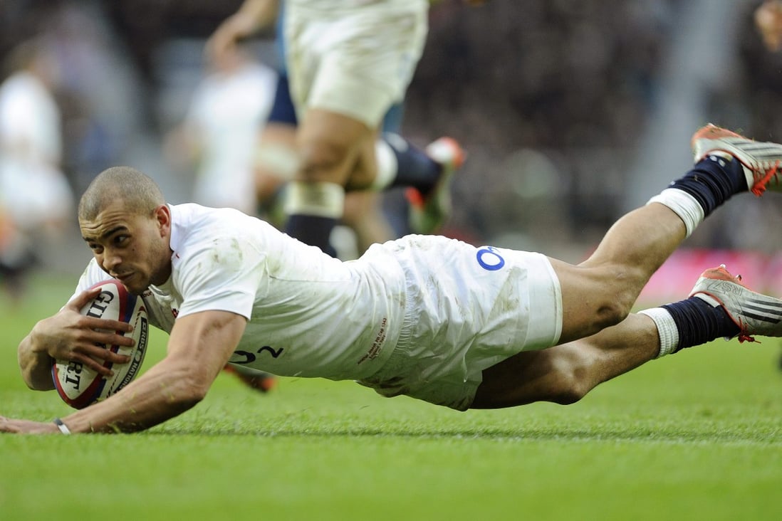 Jonathon Joseph scores one of his two tries in England's Six Nations match against Italy at Twickenham on Saturday. England won 47-17. Photo: EPA