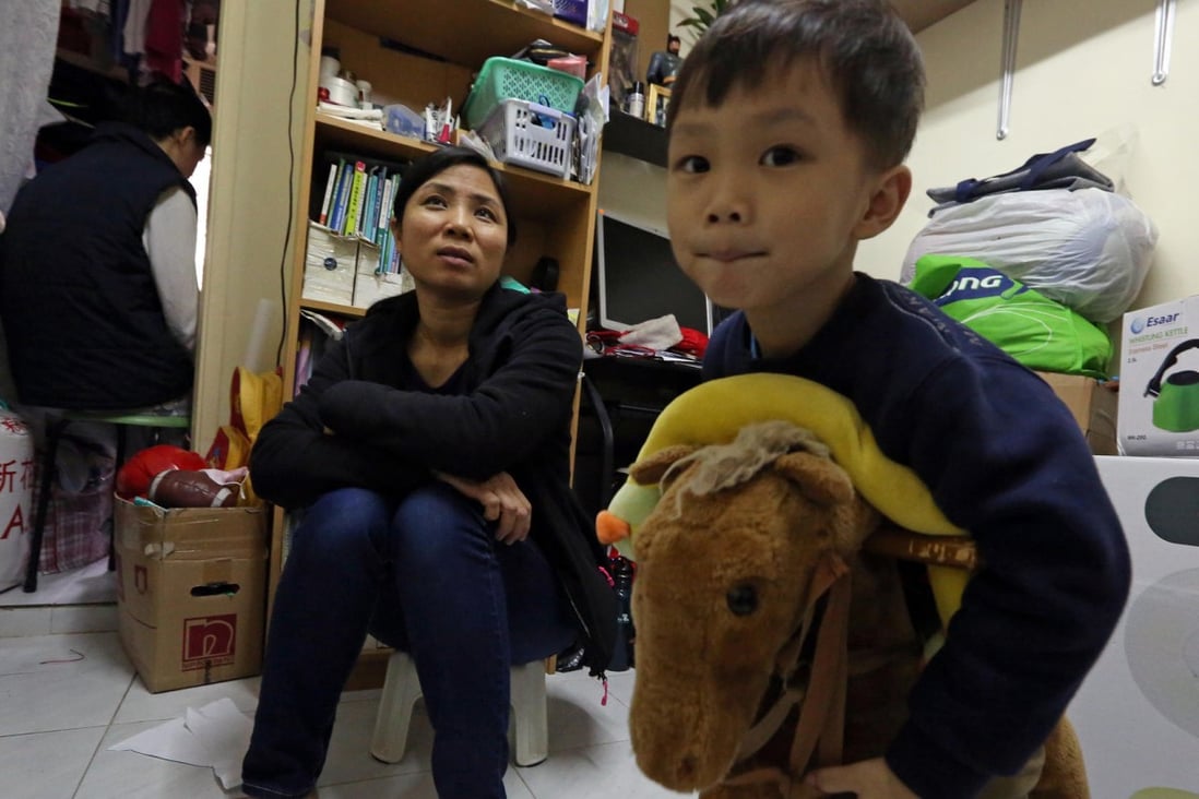 Chen Yiping with her three-year-old son Leung Pui-hei. Her husband, who works as a waiter, didn't want to show his face. Photo: Nora Tam