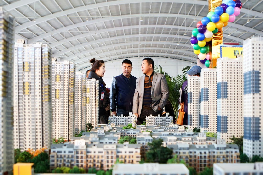 Only a third of young Chinese will accept a lower quality of life in order to buy a home. Photo: Xinhua
