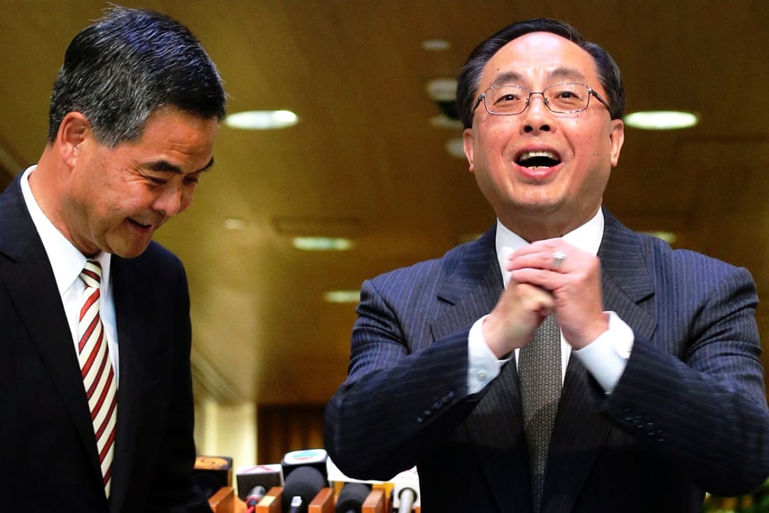 Nicholas Yang and CY Leung speak to the press at Central Government Offices in Tamar. Yang is the former executive vice-president of the Polytechnic University. Photo: David Wong