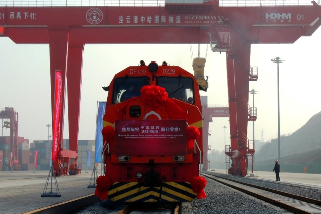 The first train runs on a new railway line linking China's Lianyungang and Kazakhstan's Almaty, a boost to the construction of the Silk Road Economic Belt. Photo: Xinhua