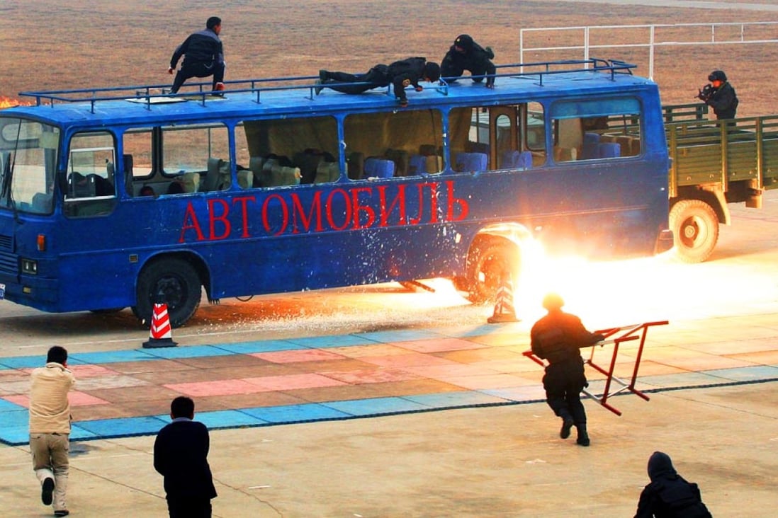 Security forces conduct an anti-terrorist drill in Beijing. Legal experts also say the proposed law would consolidate the leadership’s existing goal to bolster state power. Photo: CNS