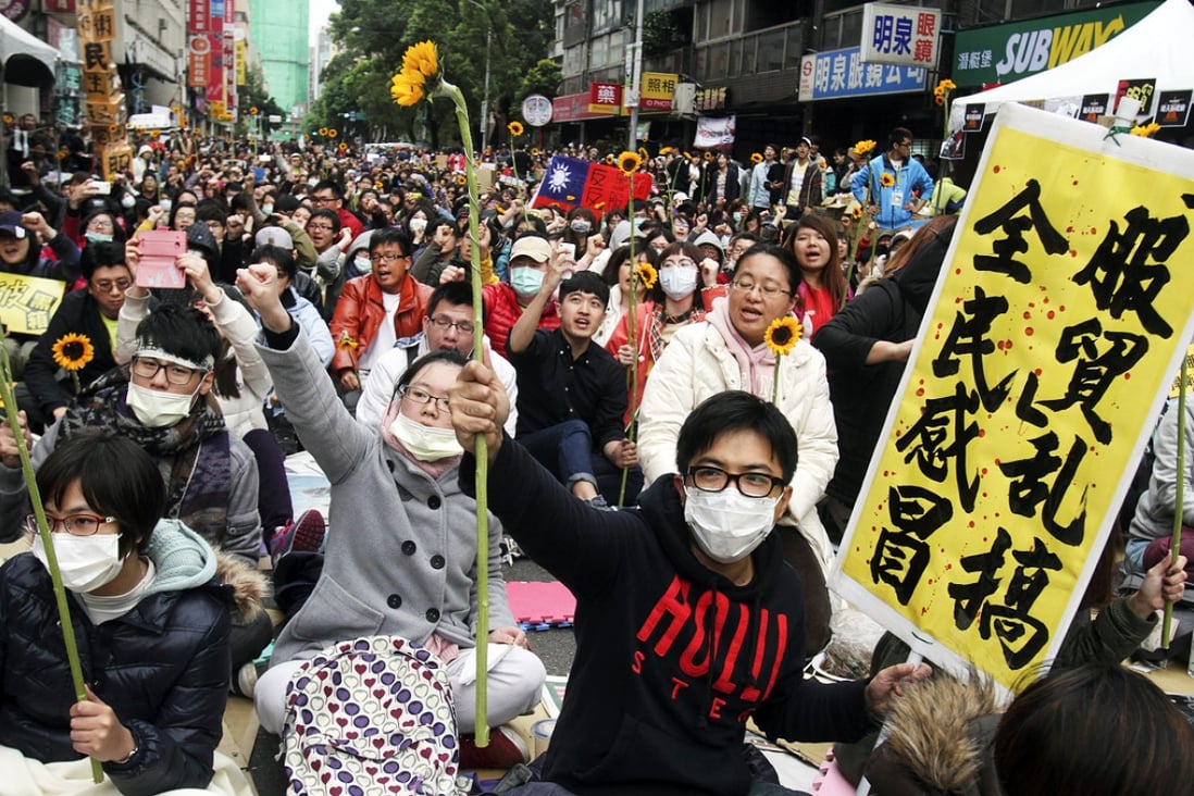 Student sunflower' movement protesters stage their rally in Taipei last March against the China-Taiwan trade pact. Photo: AP
